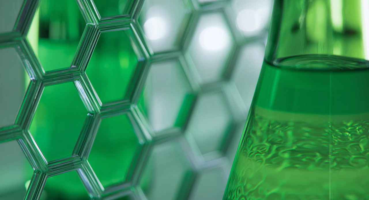 A close up AI generated image of a beaker in a bio lab.