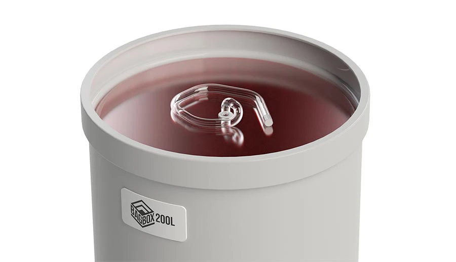 BagBox-200l-bioprocess-drum-with-open-top-showing-red-fluid-inside-a-sterile-3D-single-use-bag.jpg