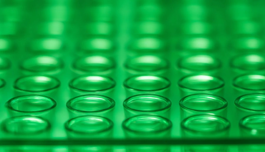 Close-up-of-green-laboratory-vials.jpg